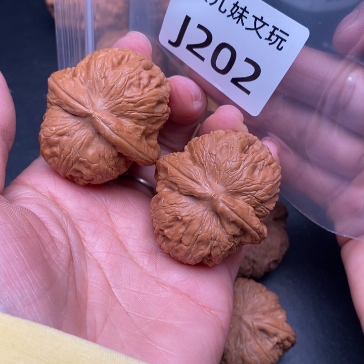 看***笑吊坠桃核J202元宝