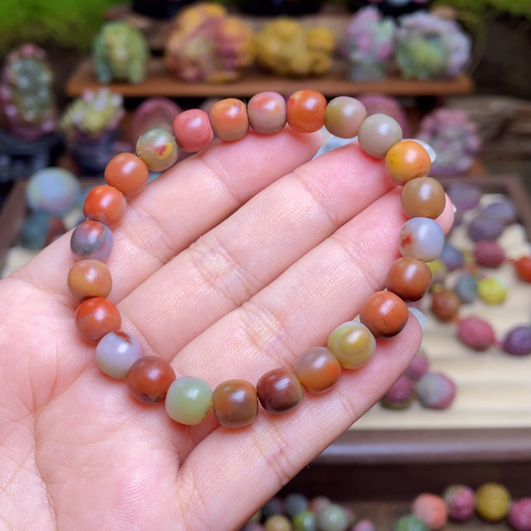 玛瑙/玉髓未镶嵌手串盐源玛瑙橘色包浆老型珠