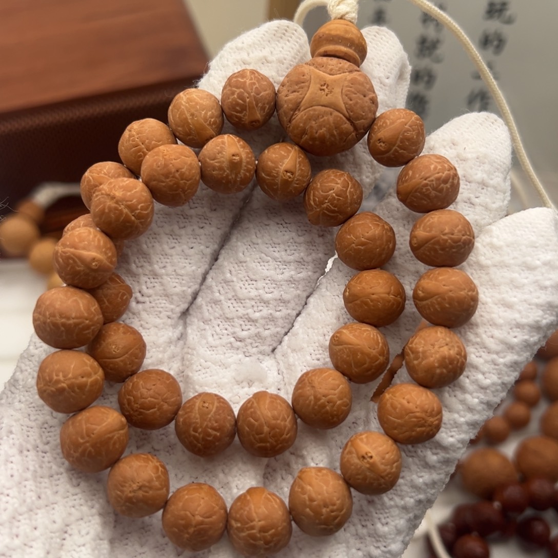 凤眼菩提吊坠TM34颗手持