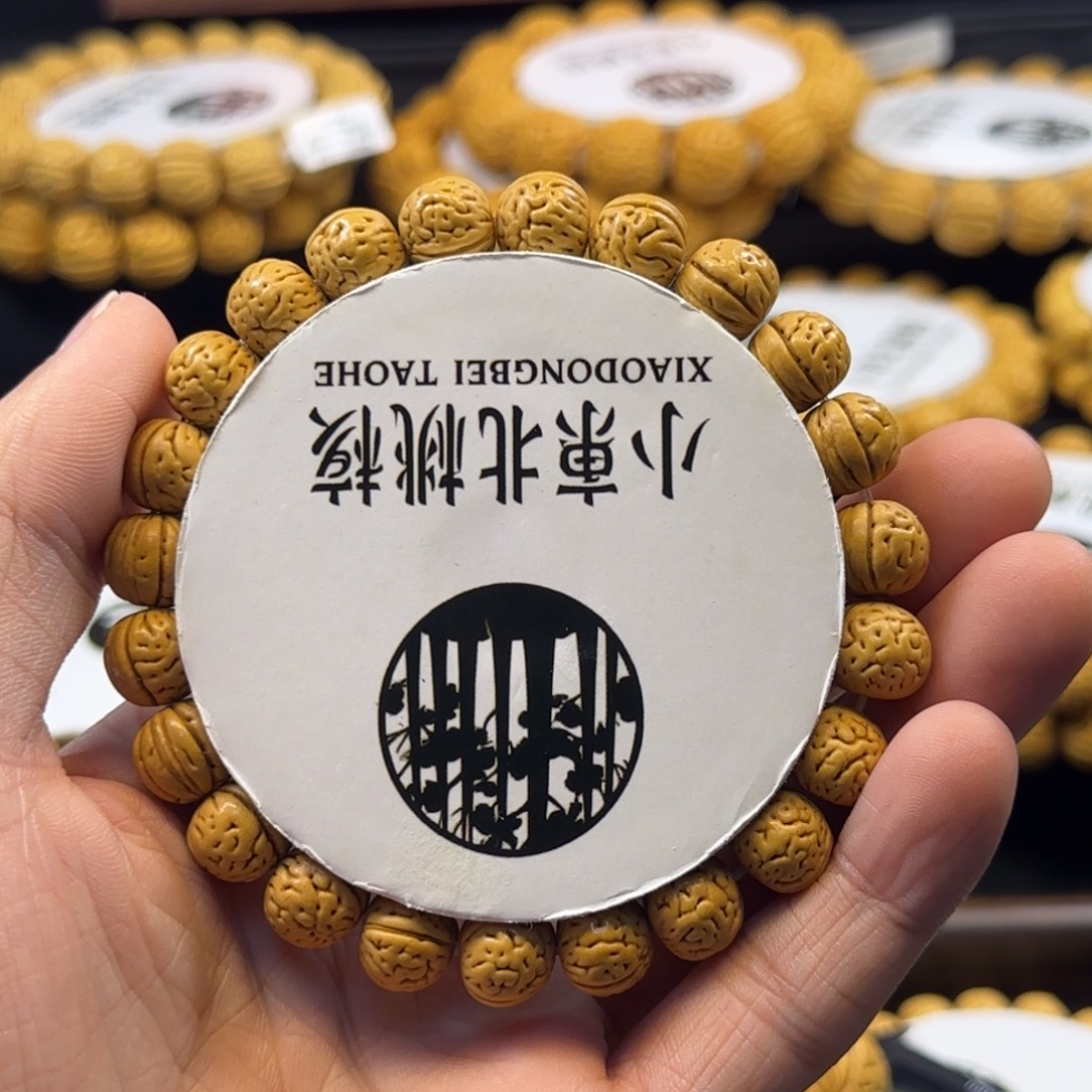 丶***颜手串桃核金丹精品