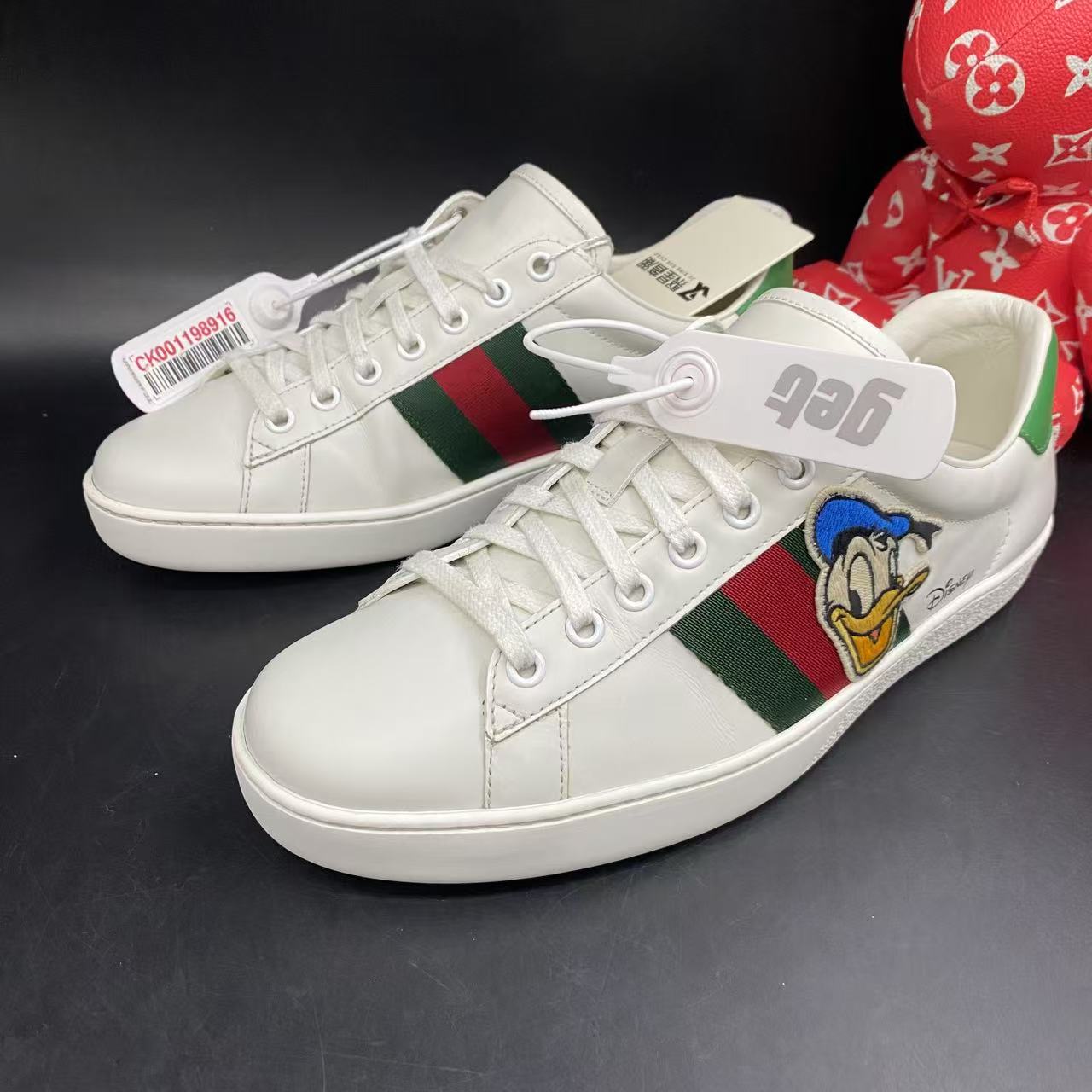 95新 GUCCI/古驰 唐老鸭白色ACE舒适时尚板鞋40.5欧码ddm1953