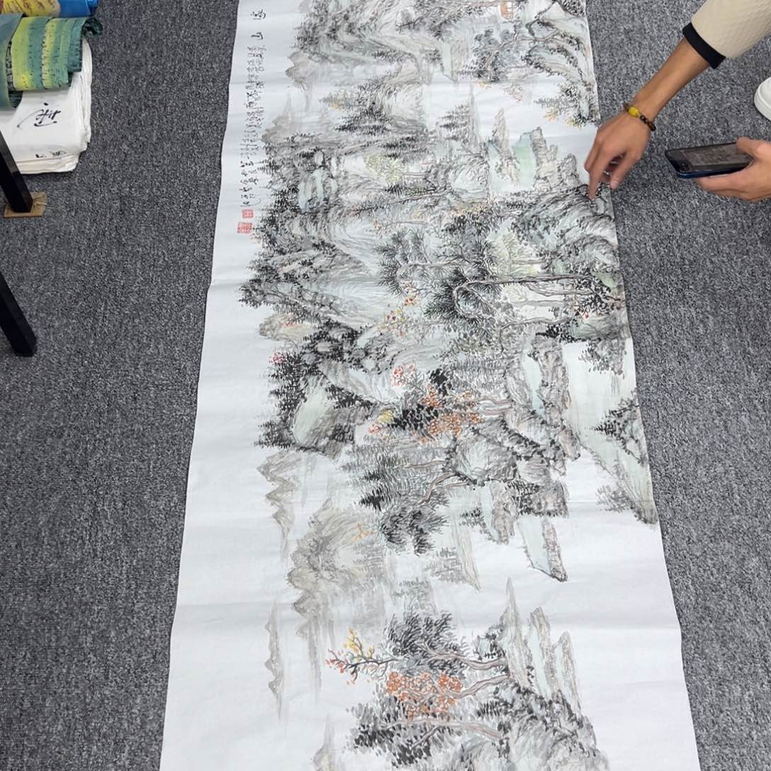 国画卖字画的小男孩