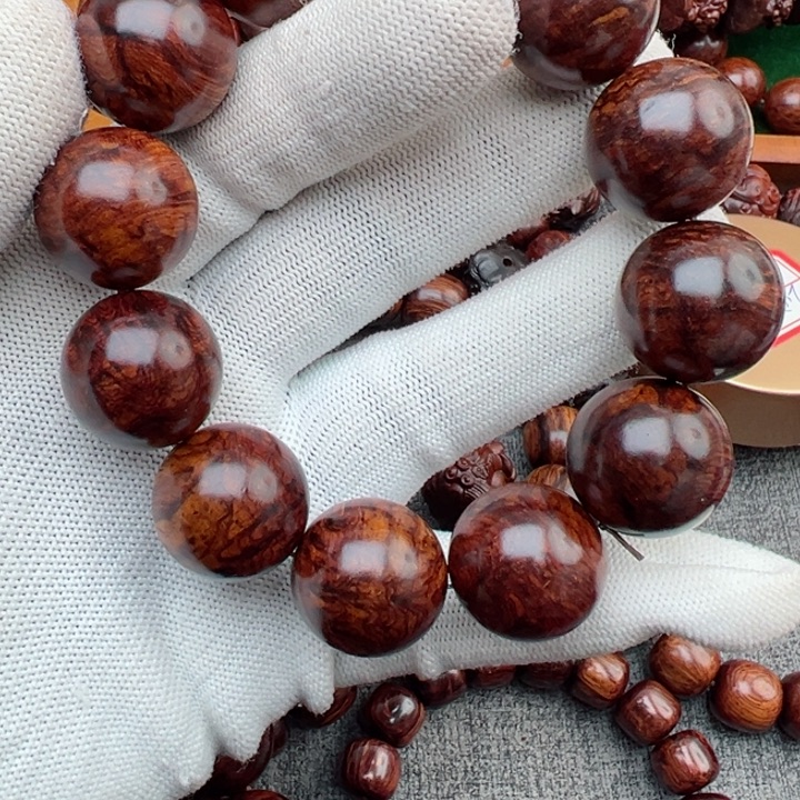 闲***闲木海南红降花梨公2.0手串