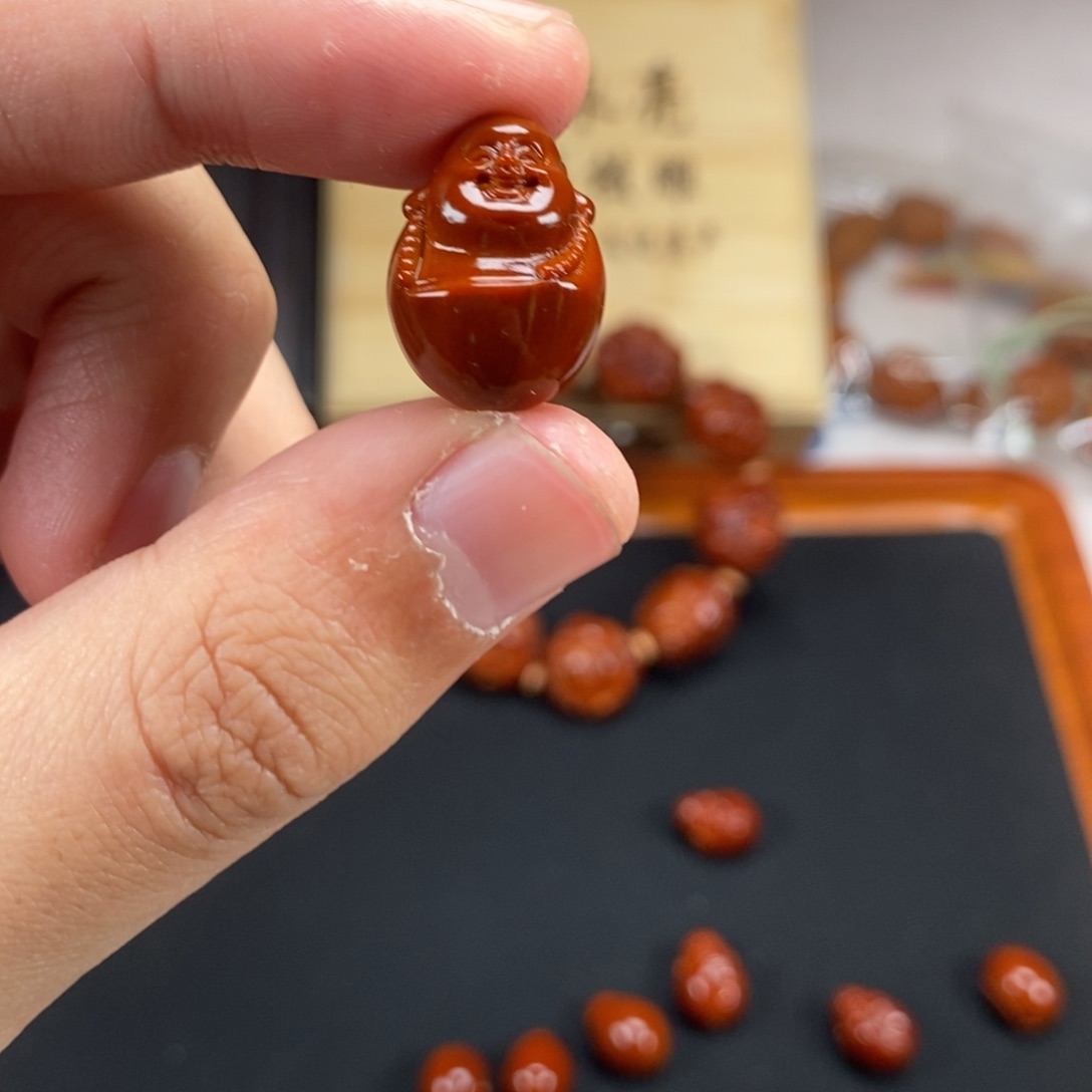 橄榄核手串孟***康星回血弥勒