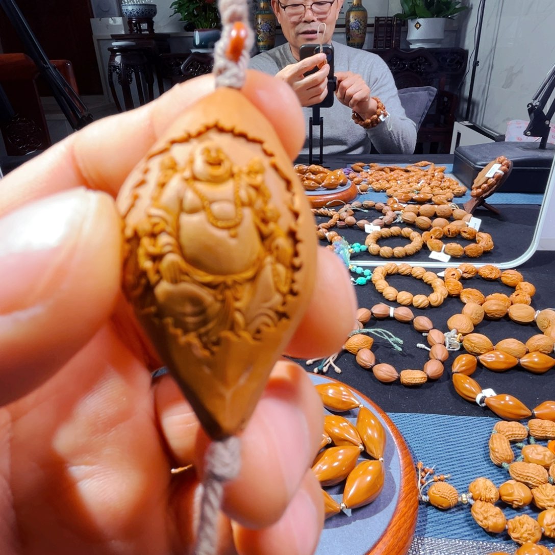 橄榄核吊坠新人在这里