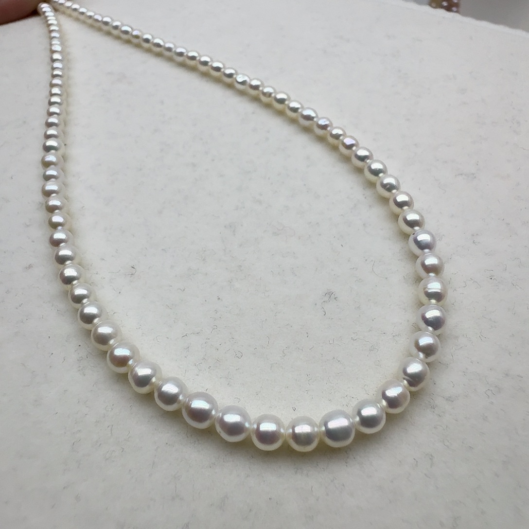 淡水珍珠颈饰银S925镶嵌手链和项链一套