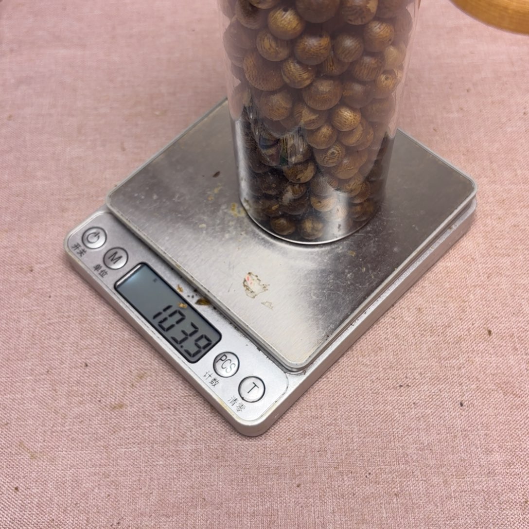 暖***风木奇楠原材料瑕散圆珠104克