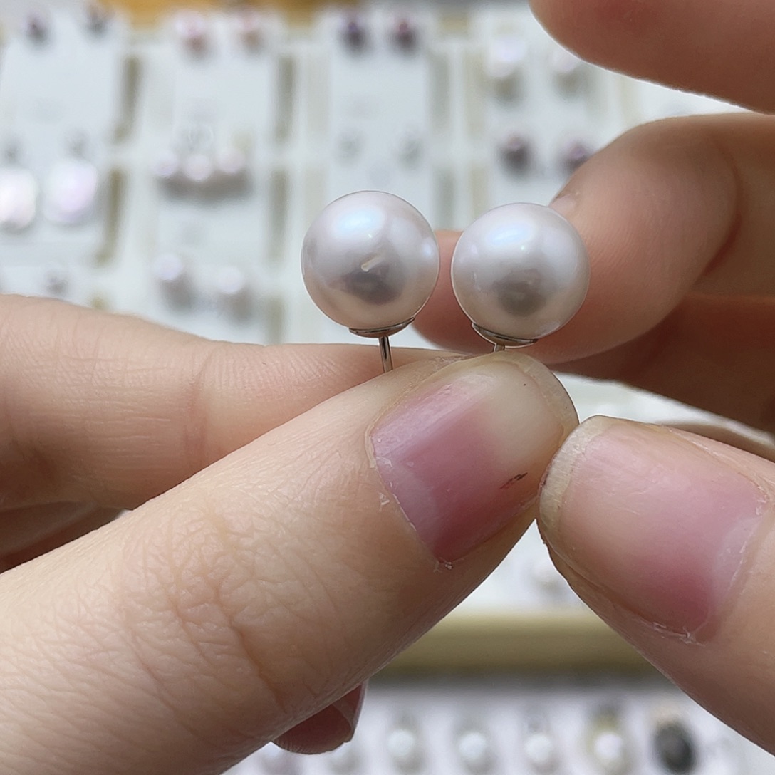 爱***解淡水珍珠银S925镶嵌耳饰