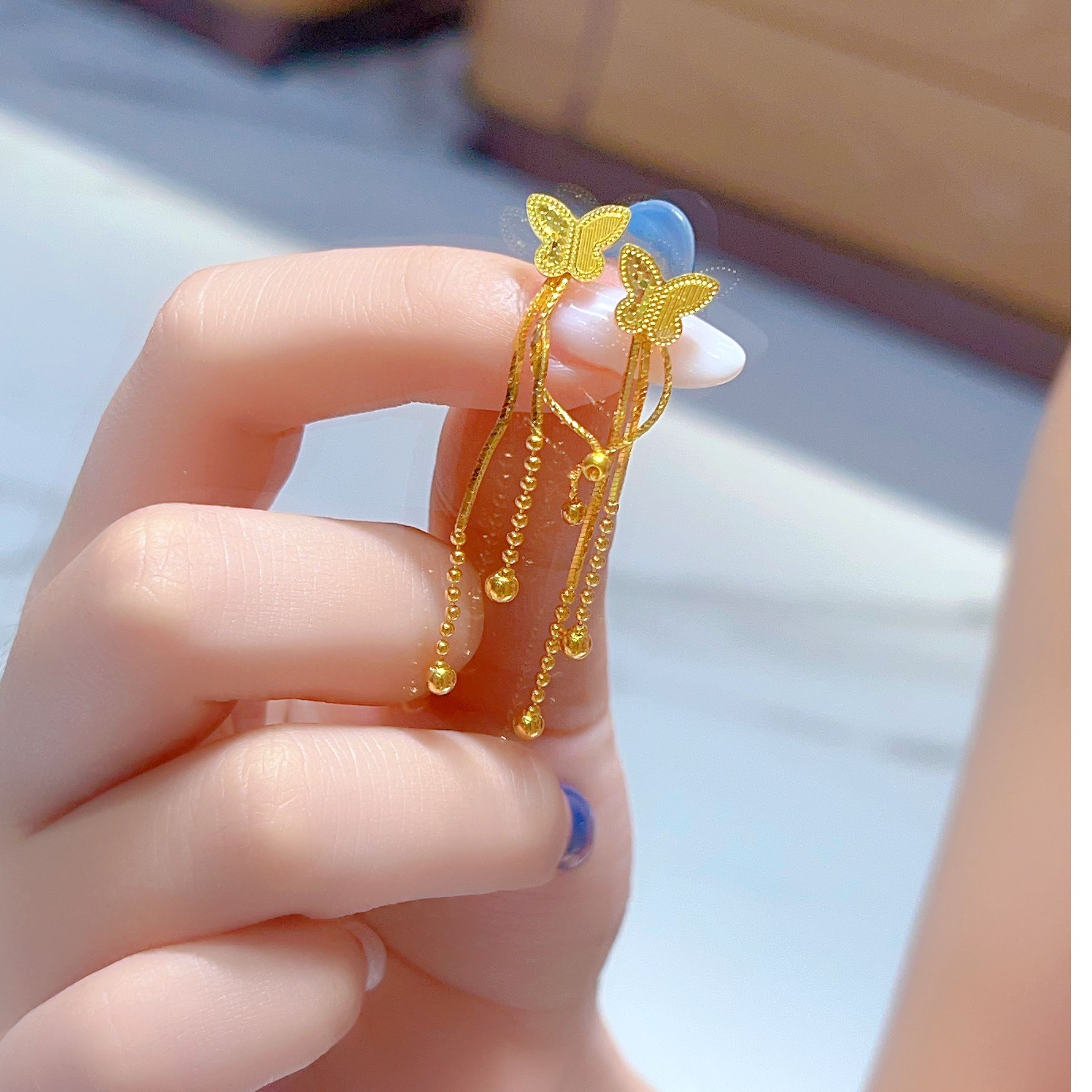 宝裕华黄金足金999 足金999 5G精品蝴蝶流苏七字勾耳饰