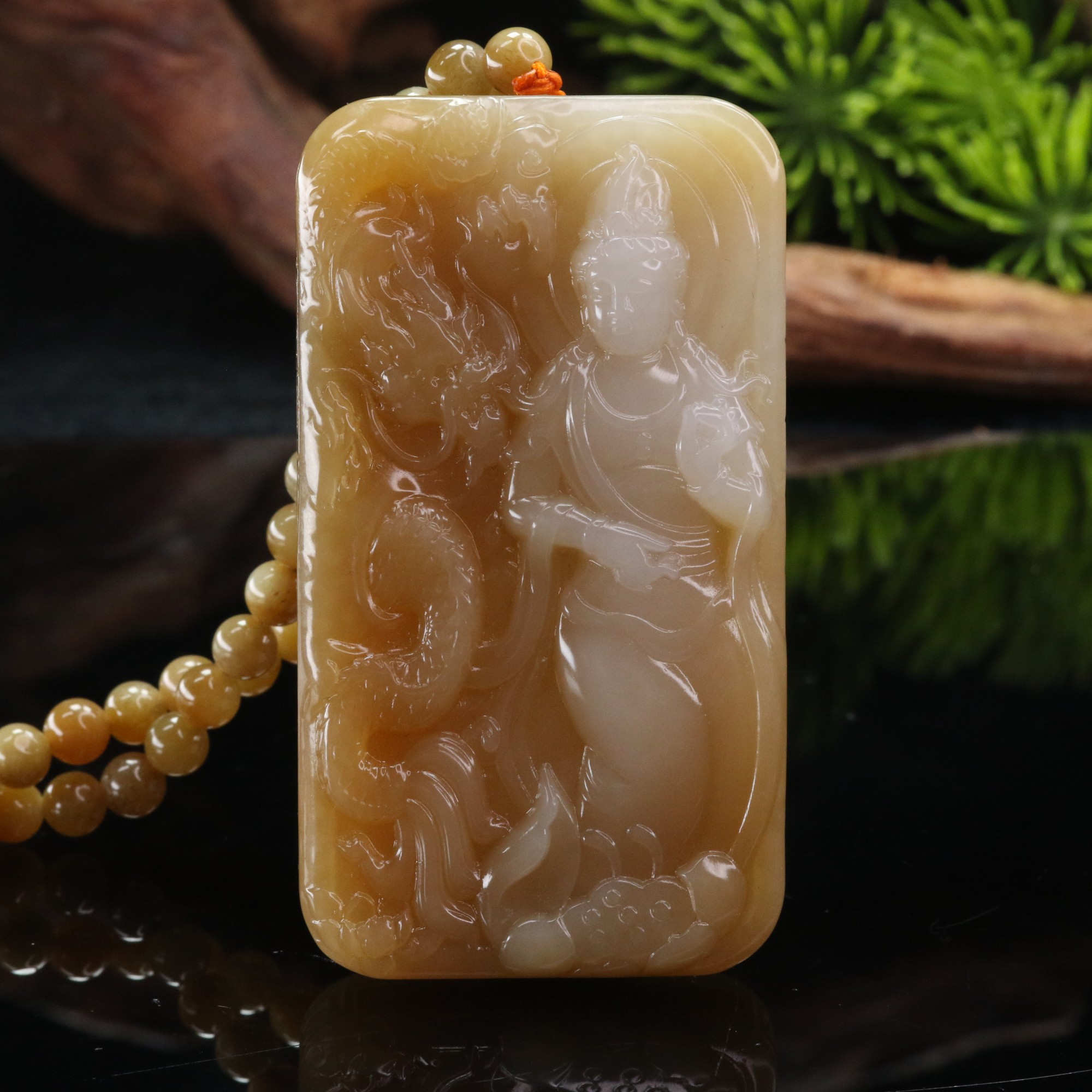 20和田玉且末糖龙观音/000583上海嘉禾拍卖