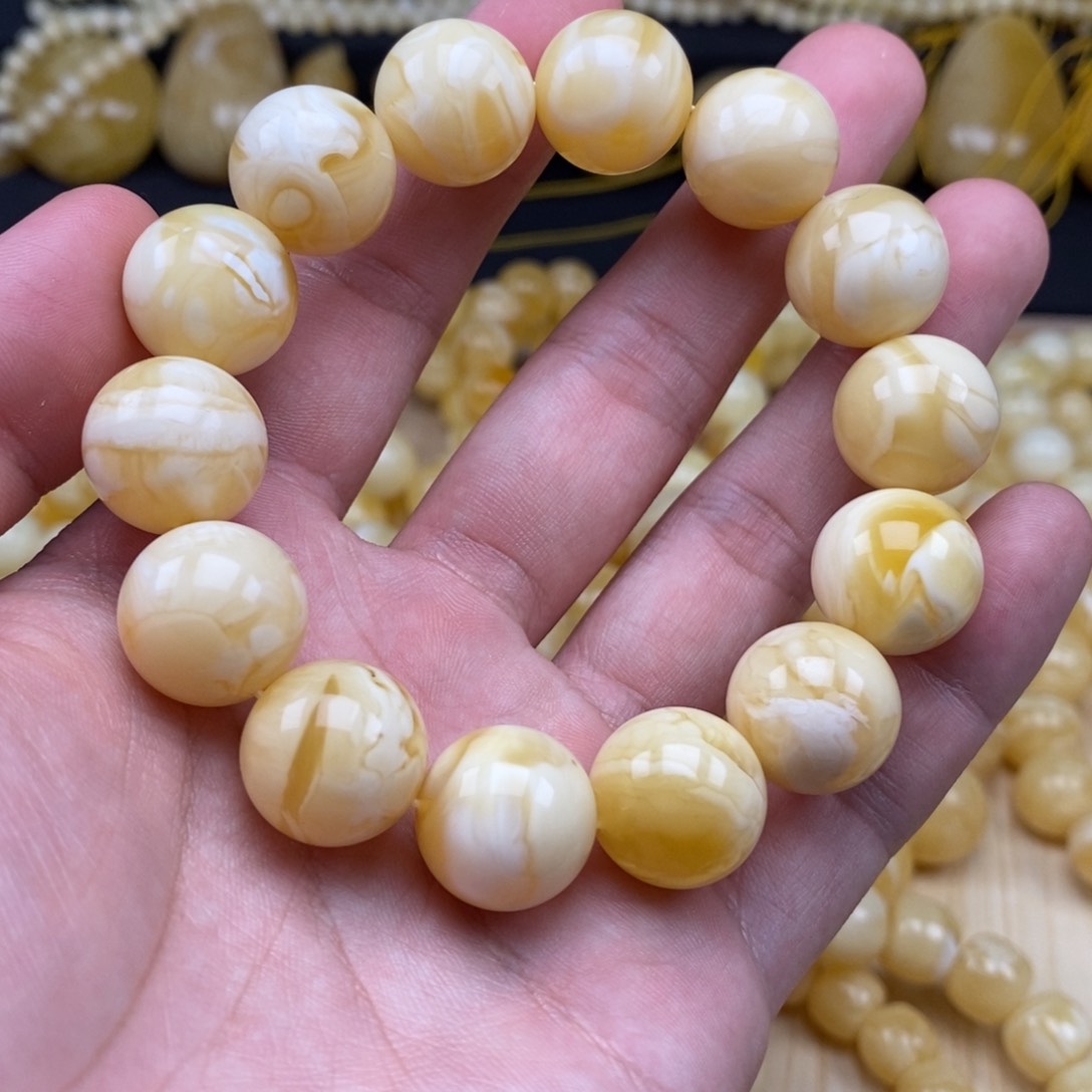 琥珀裸石未镶嵌16+俄料瓷白妖花圆珠手串