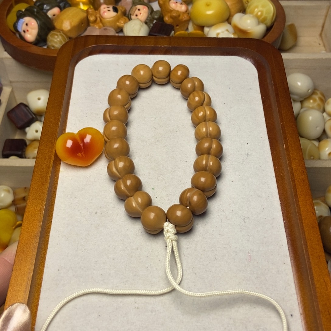 吊坠猴头核桃珂基手持微微瑕➕心不退换