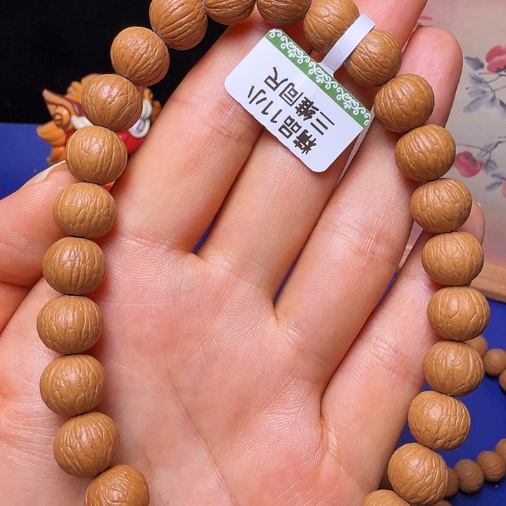 L***、吊坠猴头核桃凤羽