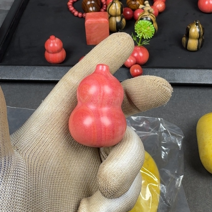 范***强粉红象牙木小葫芦一个