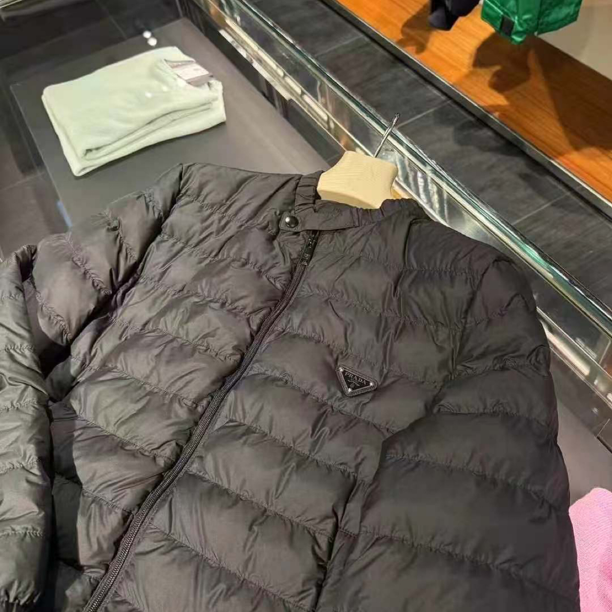 未使用 Prada/普拉达 新款黑色胸标羽绒服/54/工价26900/外套秋冬