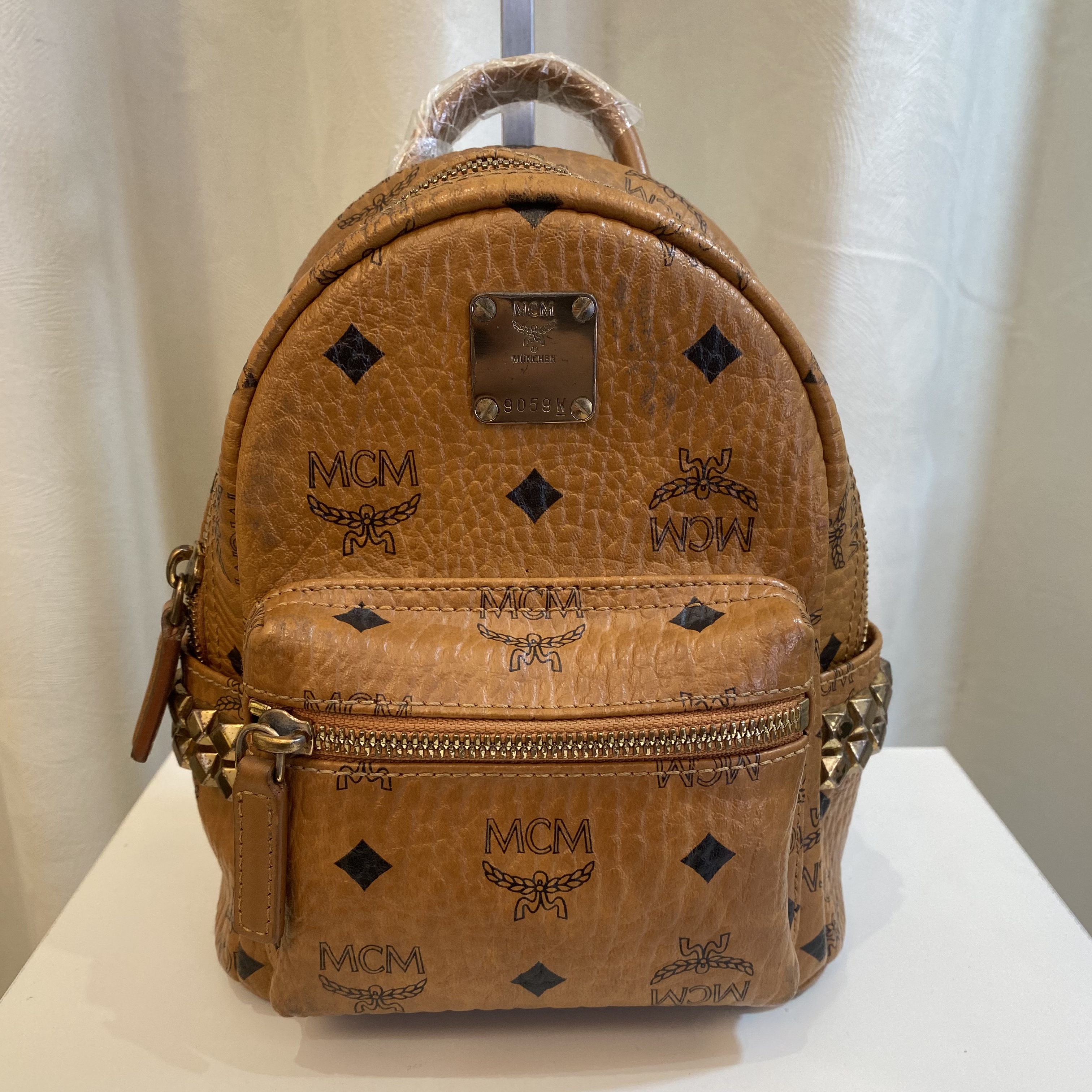 95新 MCM MCM 干邑色双肩包 000036