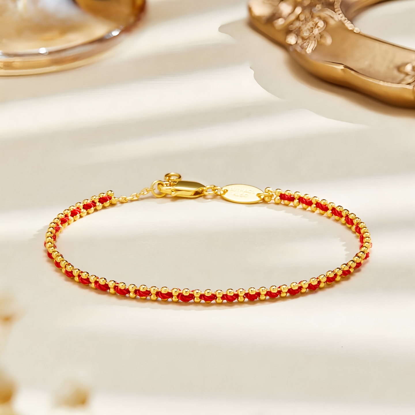 铜合金布艺手链 高定手工编制红绳手链男女红绳手链高级感轻奢