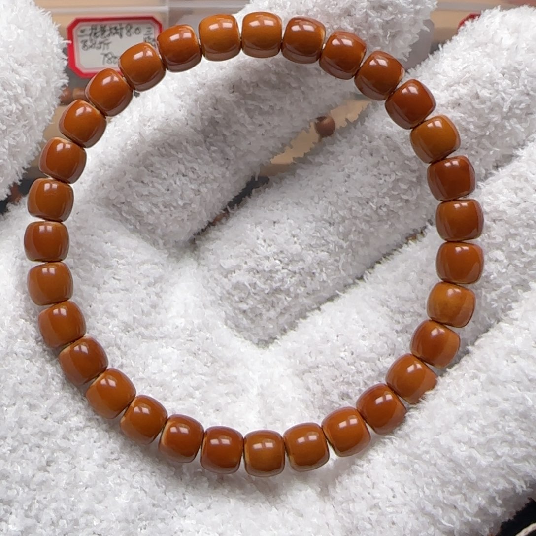 青***。橄榄核吊坠老挝7.2mm三花极限弧单圈