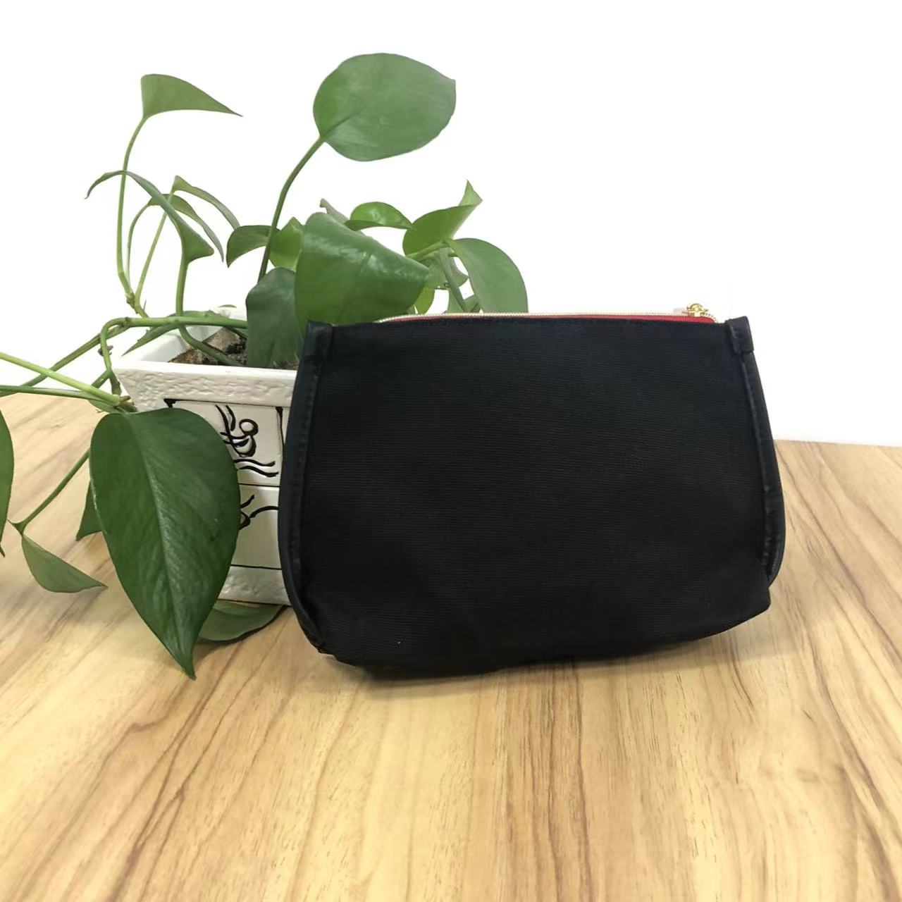 小雅啊~黑色手拿包包