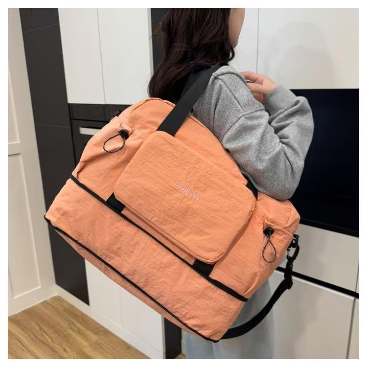 旅行包手提刺绣单肩斜挎耐磨纯色防水可折叠百搭韩风旅行袋时尚