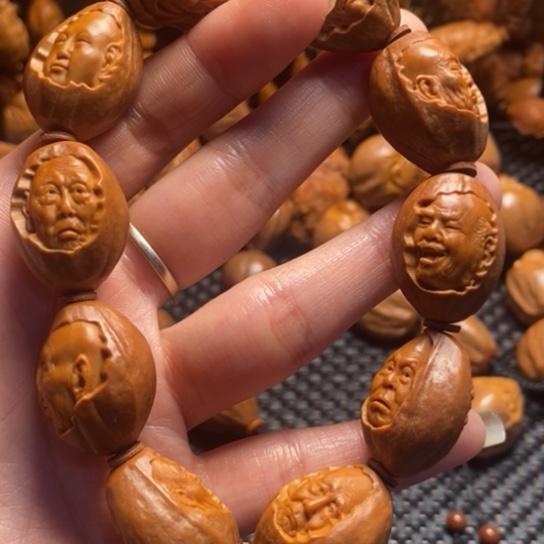 橄榄核吊坠包衣罗汉