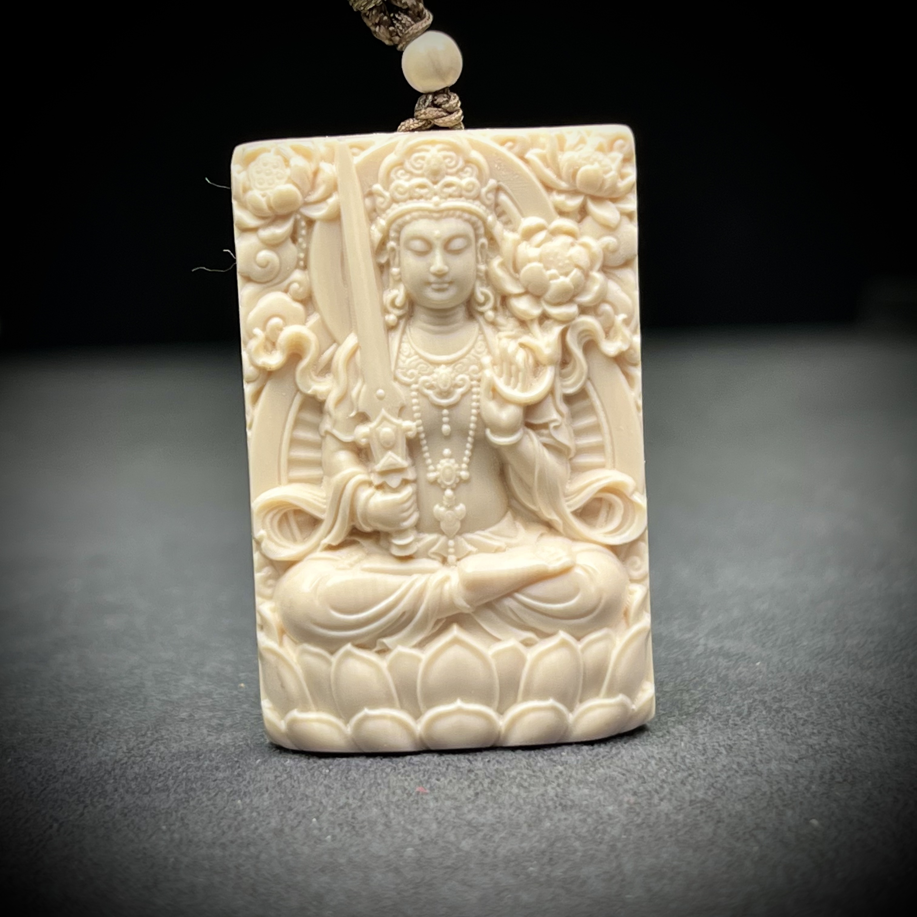 D05-1O天然猛犸象牙 千手观音29×44mm支持鉴定 假一罚四