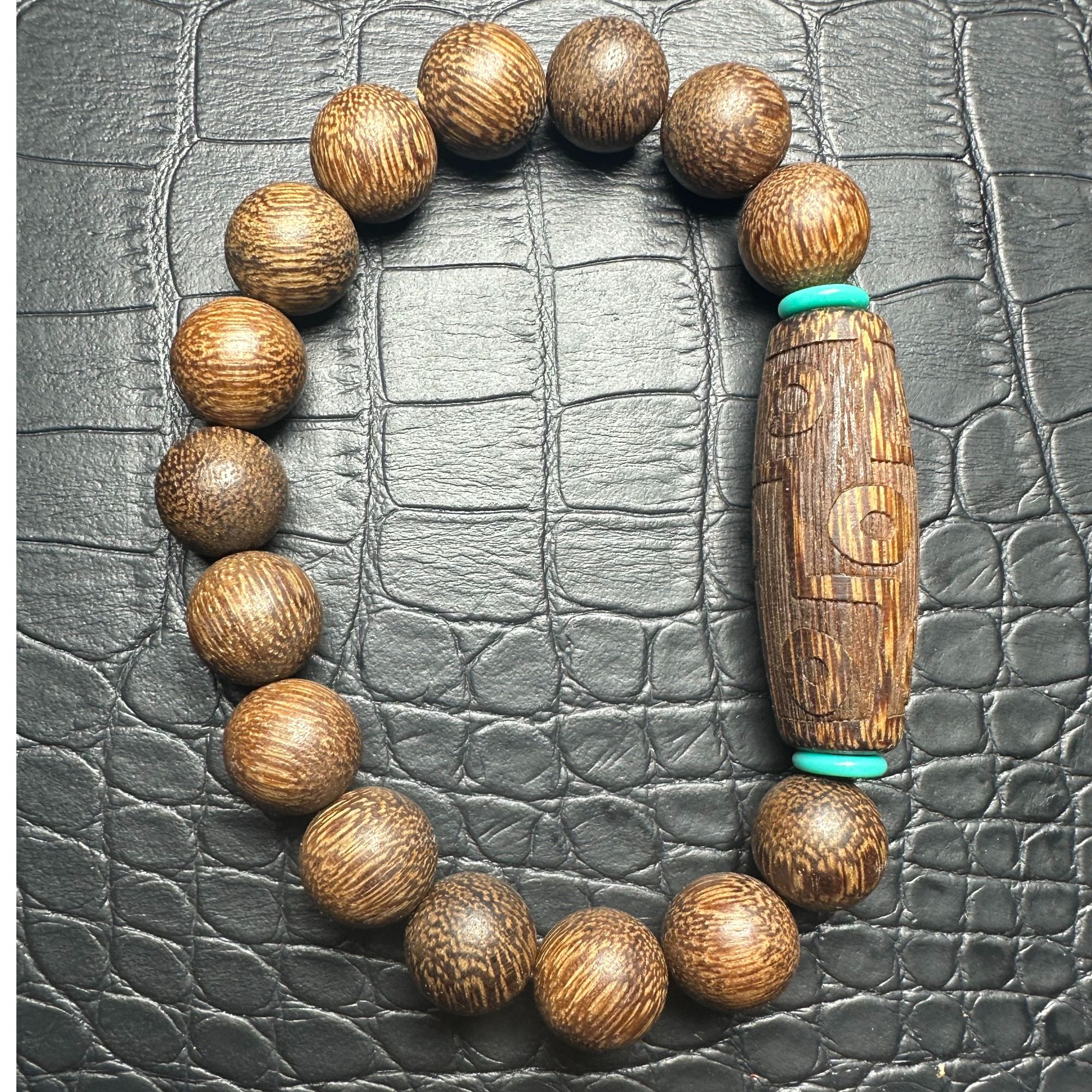 689沉木圆珠手串