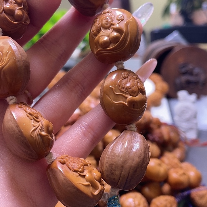 覃***天橄榄核吊坠橄榄核雕