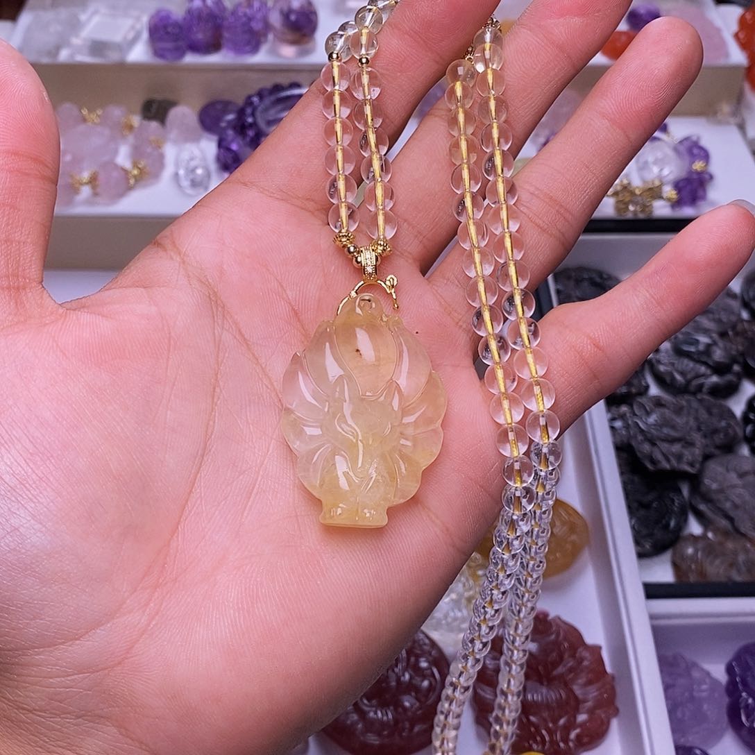 水晶颈饰未镶嵌黄胶花炸尾九尾狐吊坠 送链子