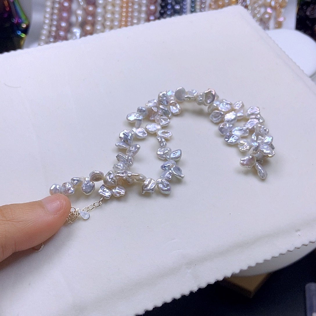 淡水珍珠合金颈饰榴*刘