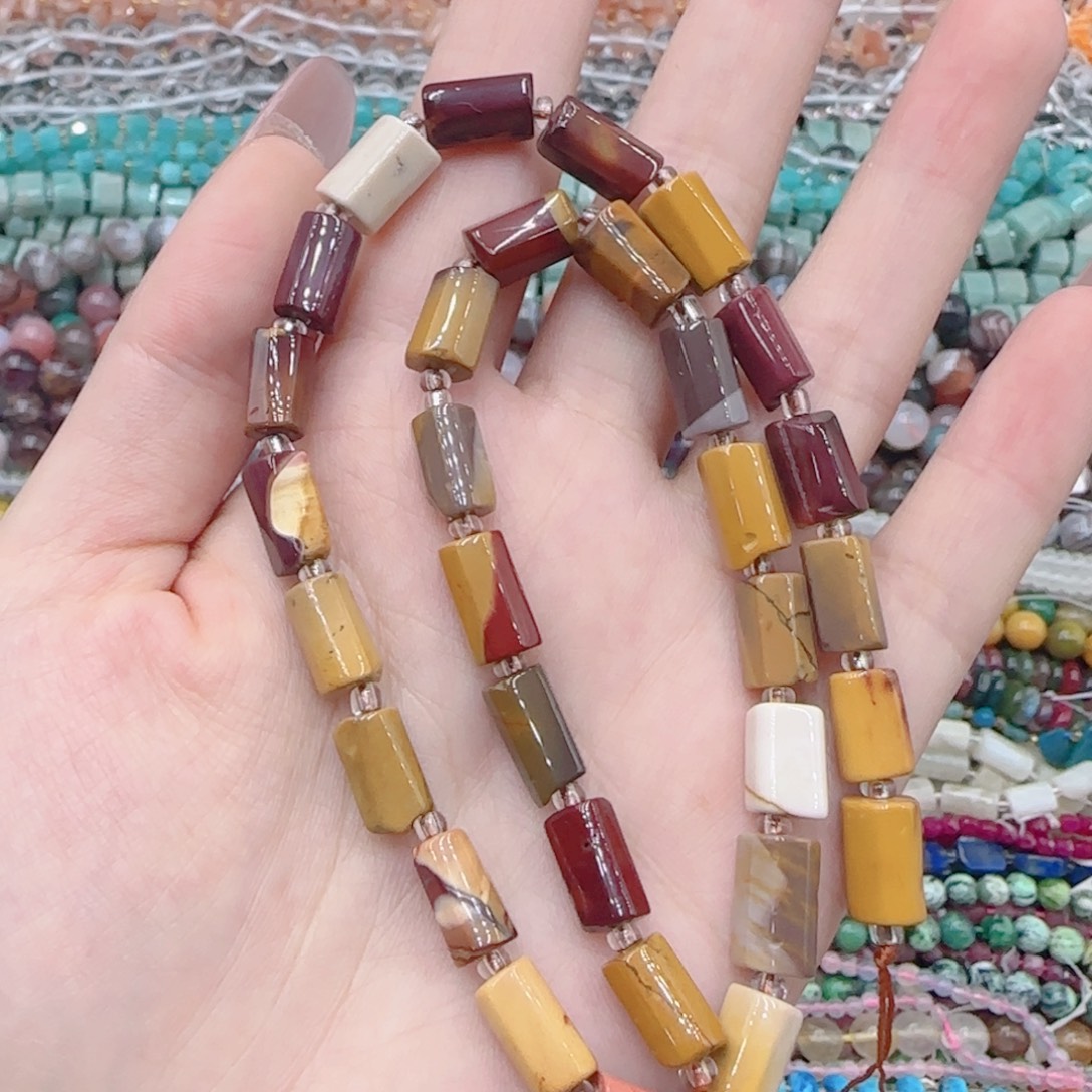 玛瑙/玉髓未镶嵌珠宝半成品老矿蛋黄石手工管珠一条