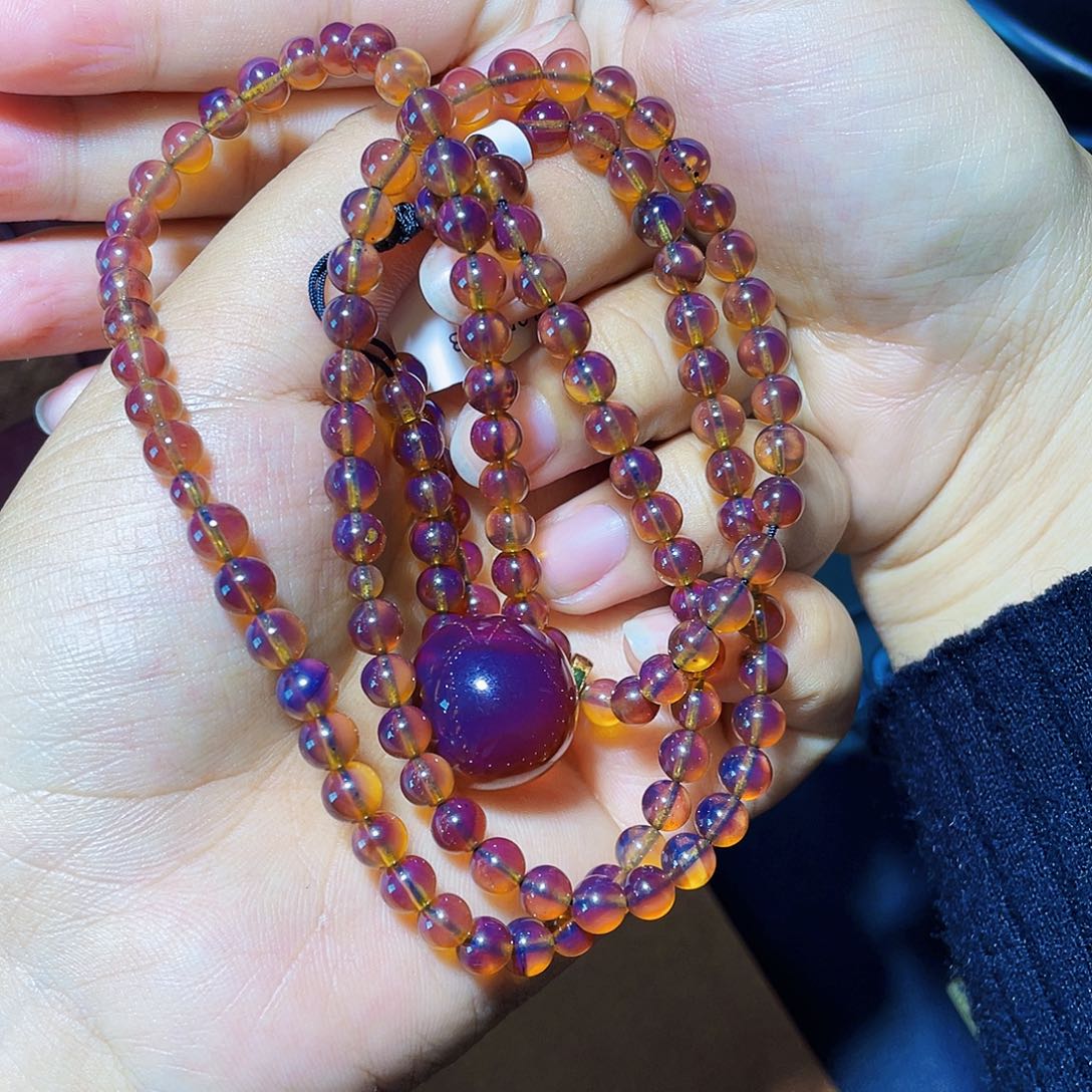 琥珀裸石未镶嵌紫蜜鸟蛋项链