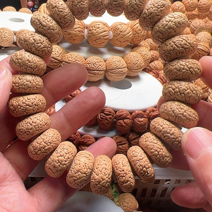 桃核手串狼牙蚂蚁夹板桃核手串20+尺