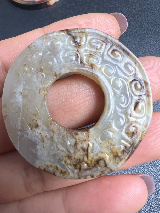 和田玉。谷纹玉环