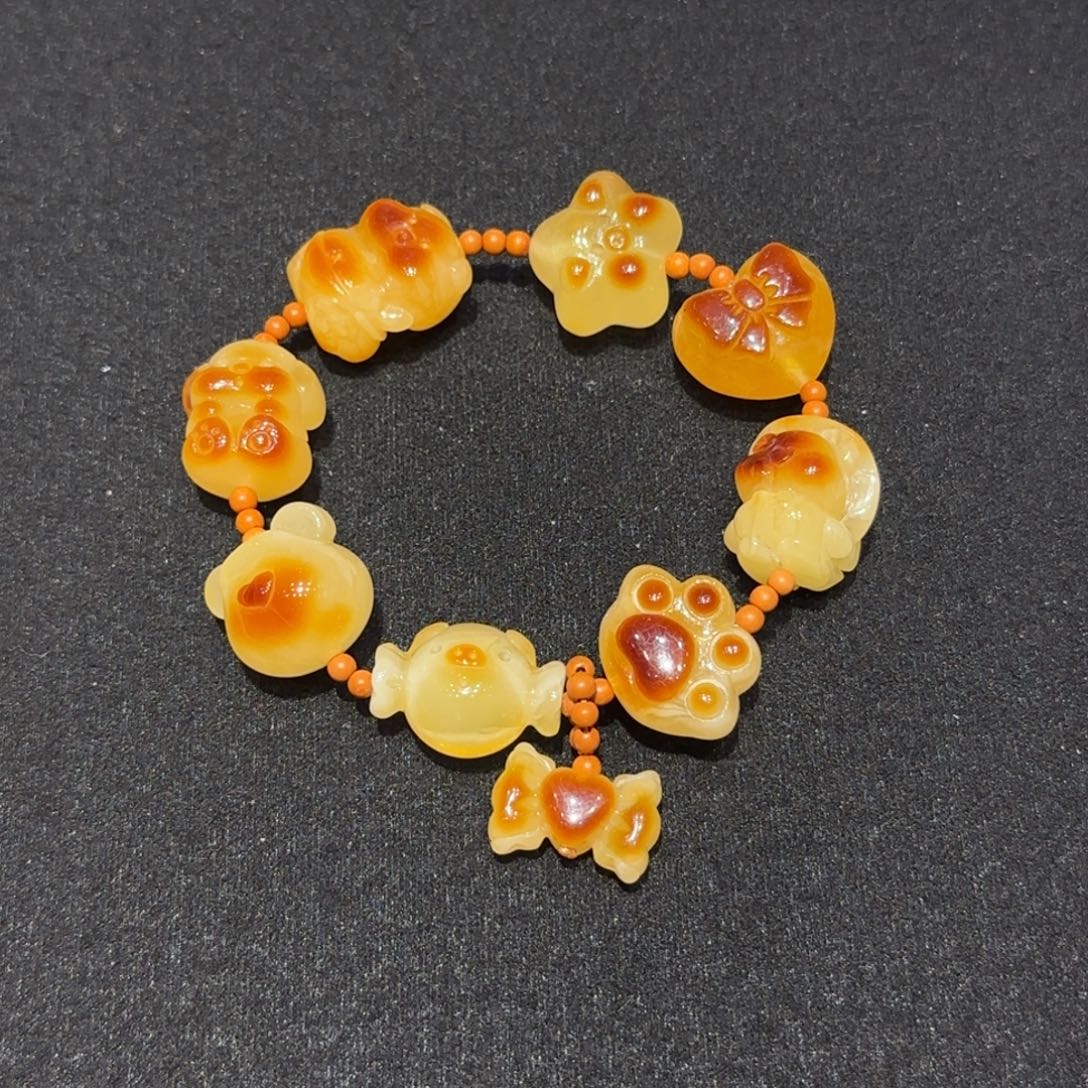 琥珀未镶嵌珠宝奇石焦皮俏色可爱联盟多宝手串