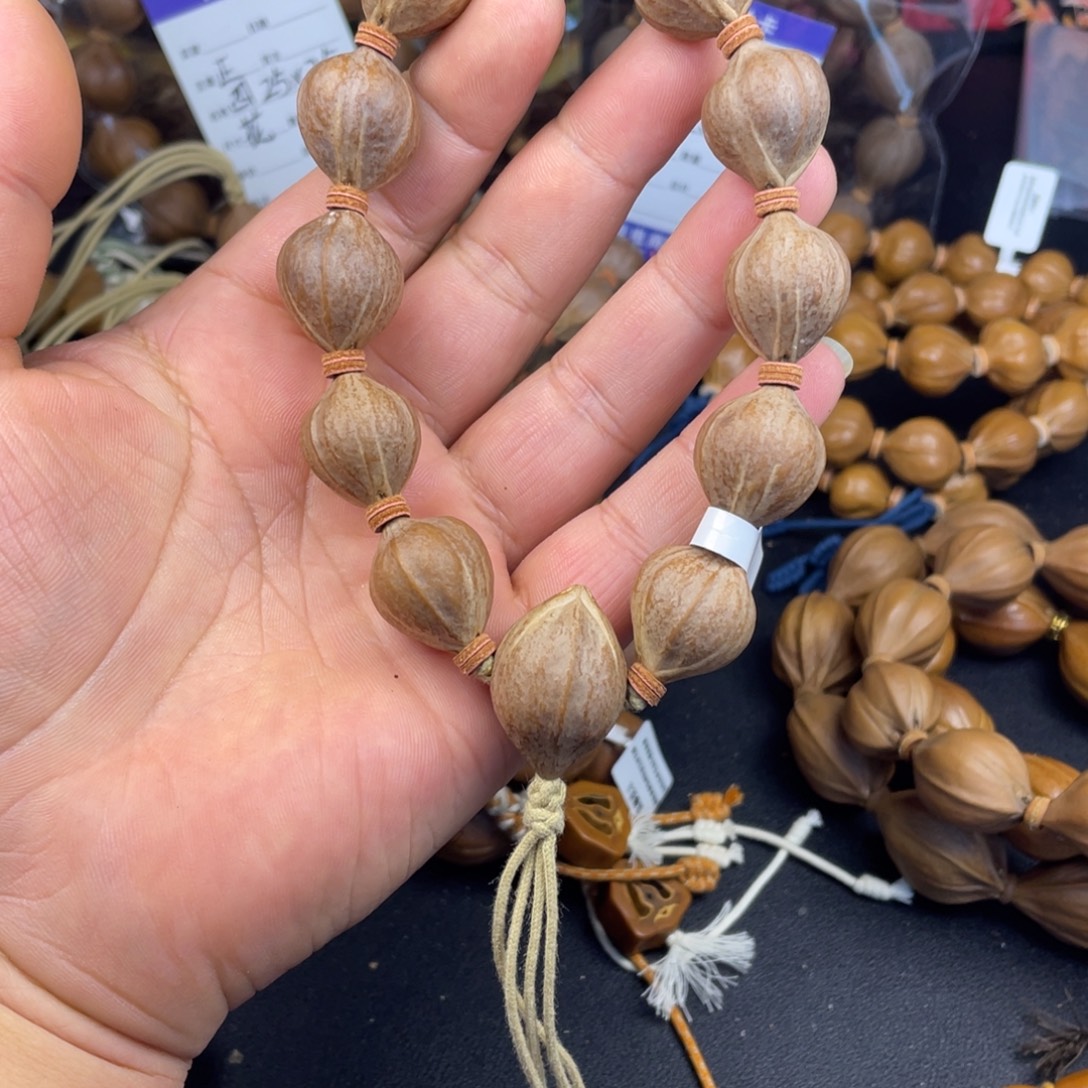 天***淡橄榄核手串红肉18mm