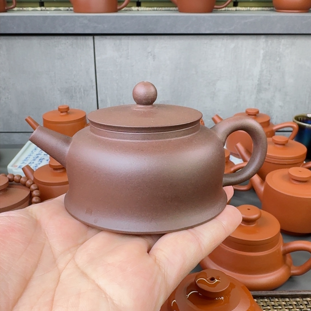 紫砂茶壶微瑕半手曲钟