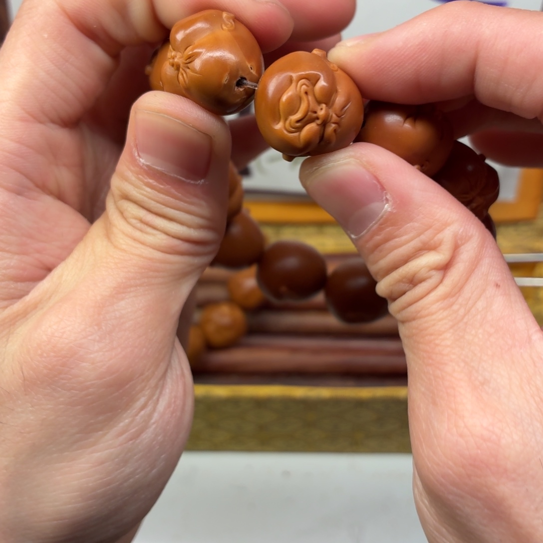 剑***出橄榄核吊坠瑕疵人生百态