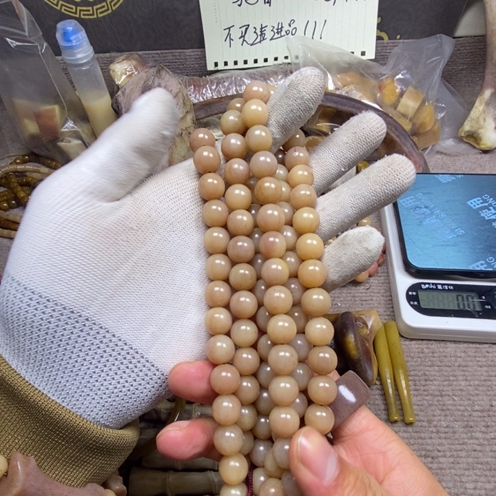 汪***涛橄榄核吊坠1,2脖挂于睡觉咯了