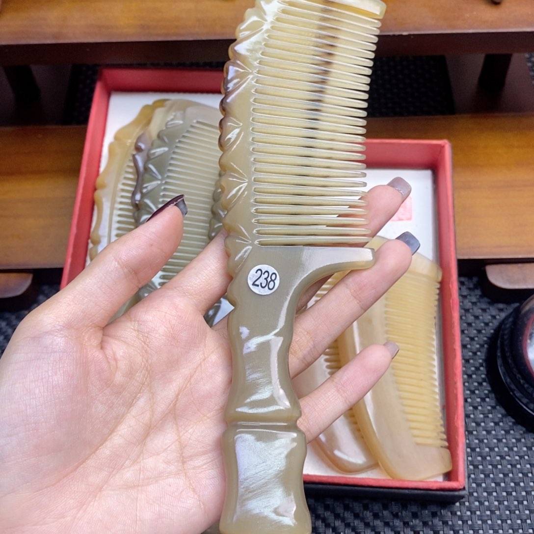 纯手工制作纯牛角梳梳子简***?