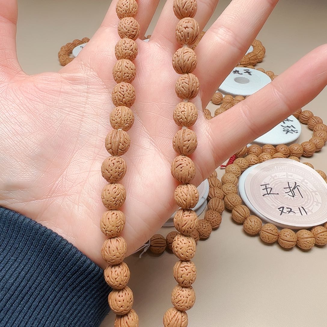 桃核手串1.0小元宝大手持