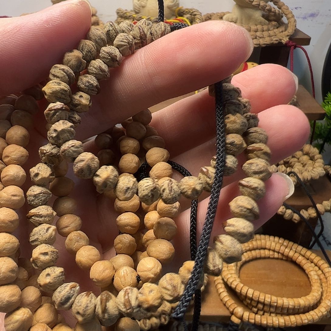 苏***.柏香籽/百香籽吊坠