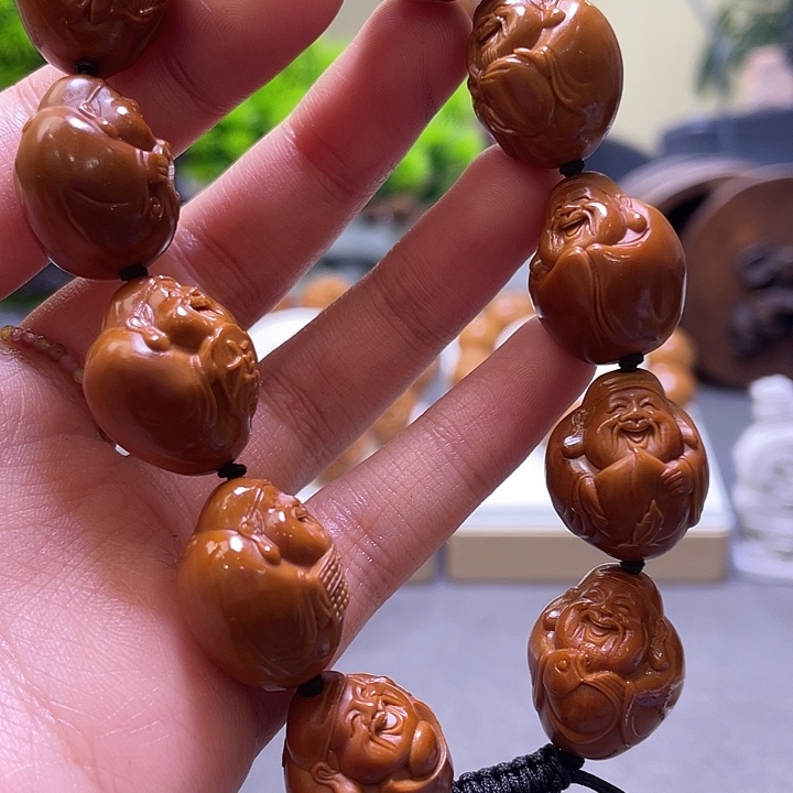 酸***手橄榄核吊坠橄榄核雕