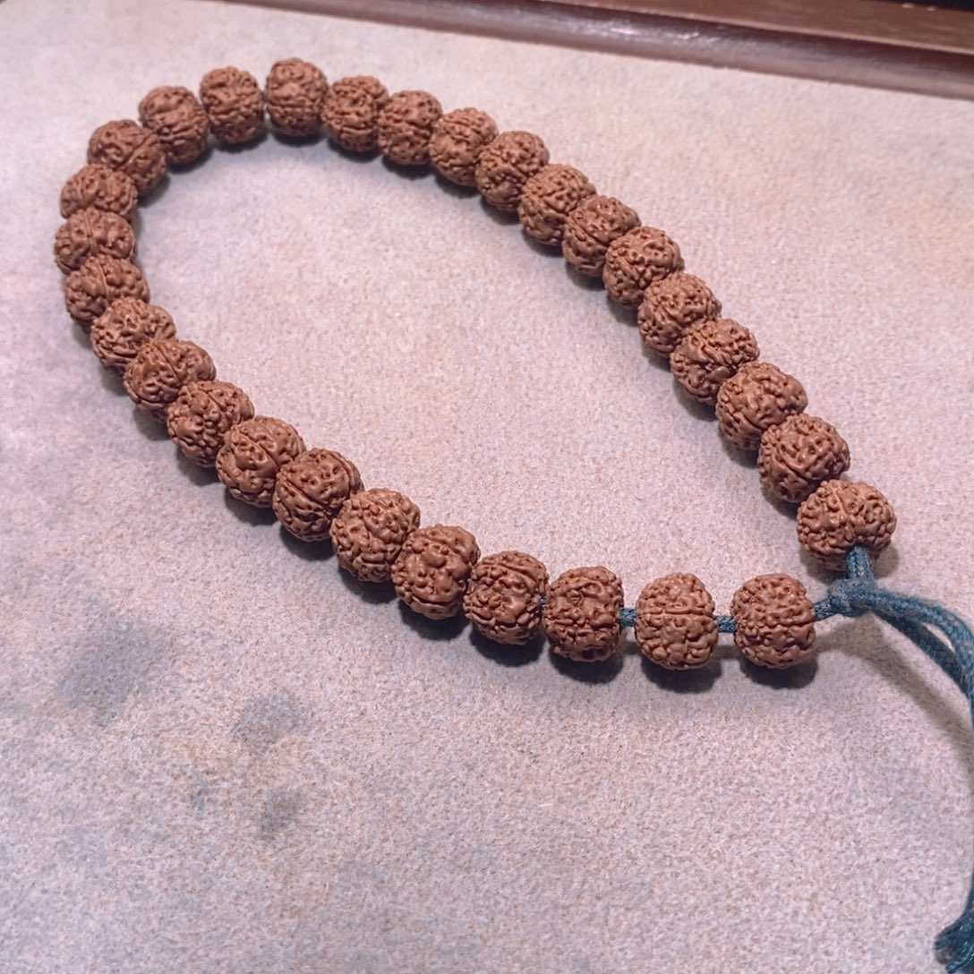 哈***静手串金刚菩提平细