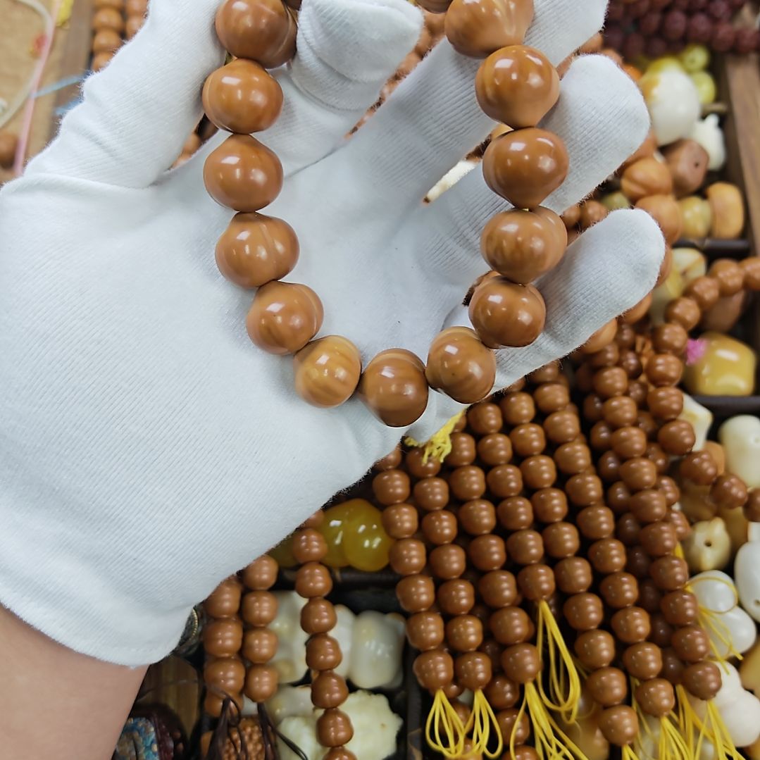 似***梦猴头核桃吊坠屁桃手串