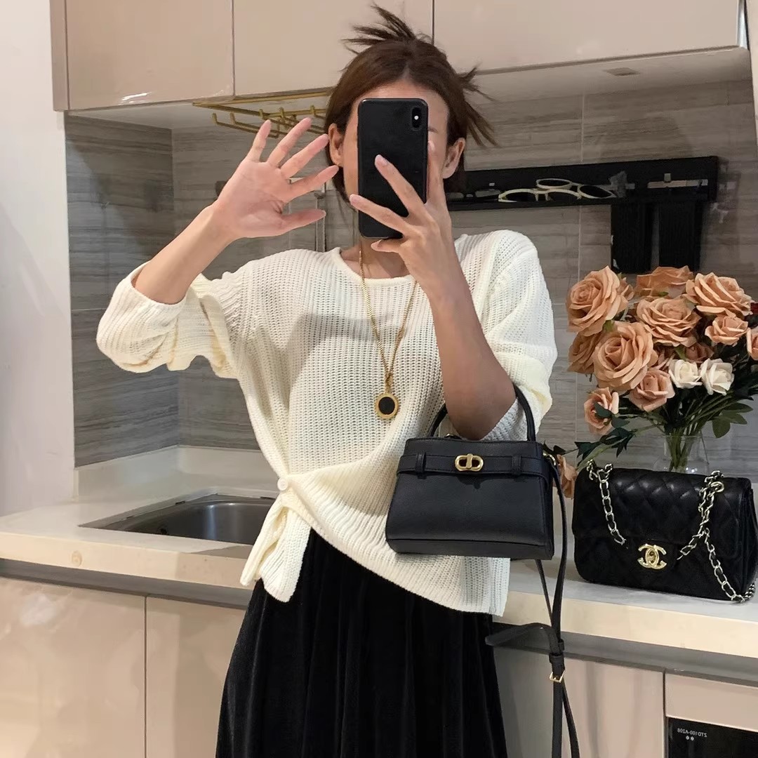 韩系设计感下摆提扣针织衫女秋季新款百搭简约休闲纯色毛衣T9448