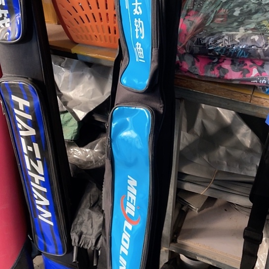 黑蓝双层瑕疵杆包。    