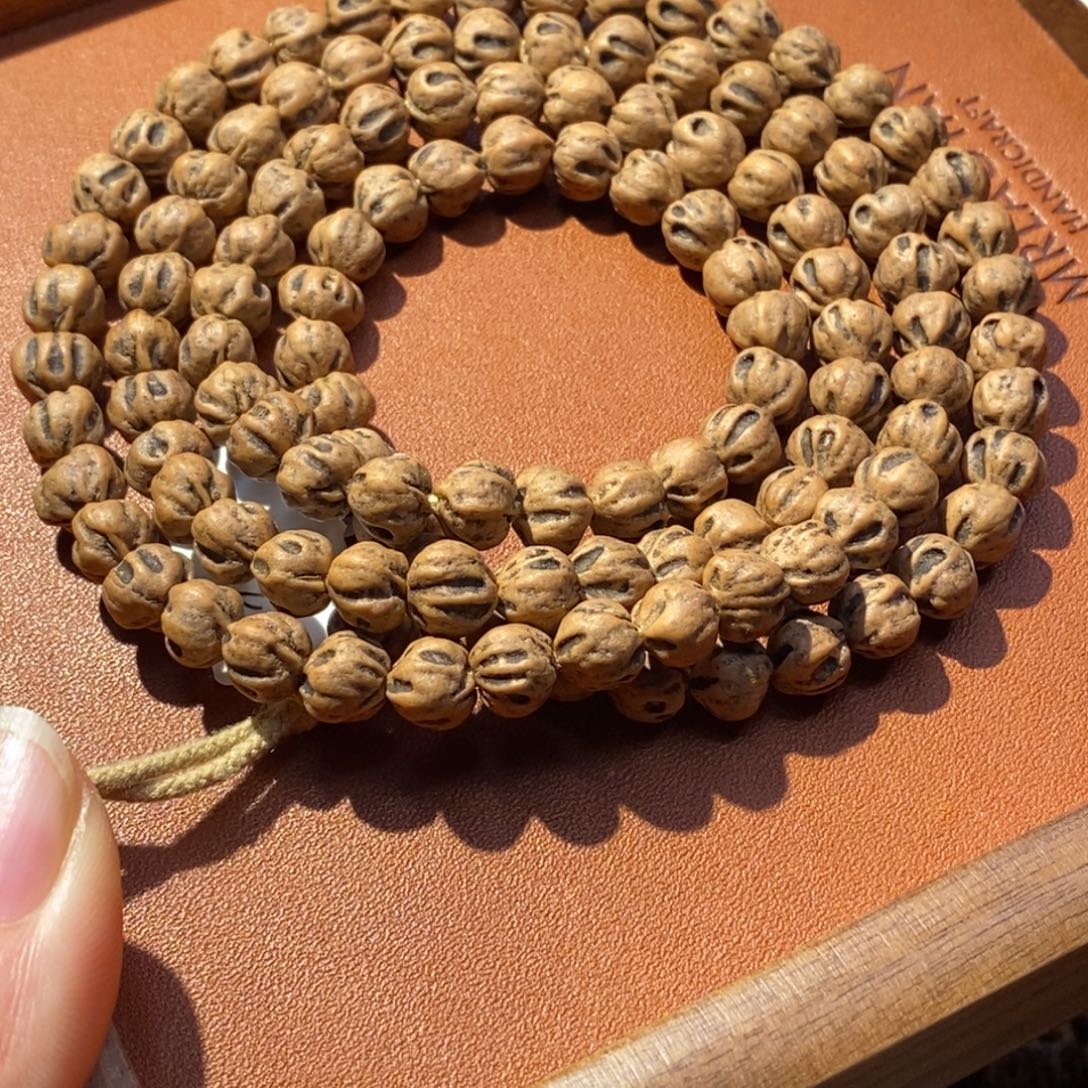 峰***骑柏香籽/百香籽吊坠