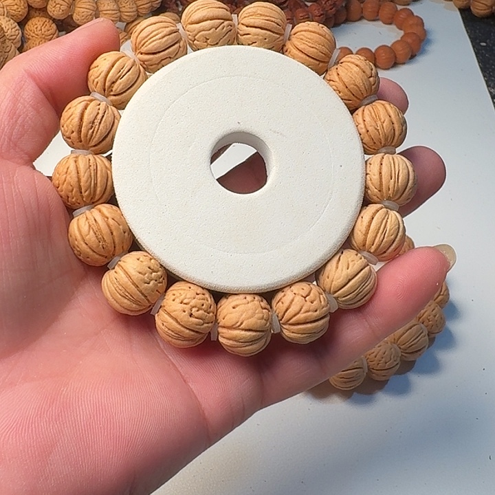 桃核吊坠斤丹桃核手串