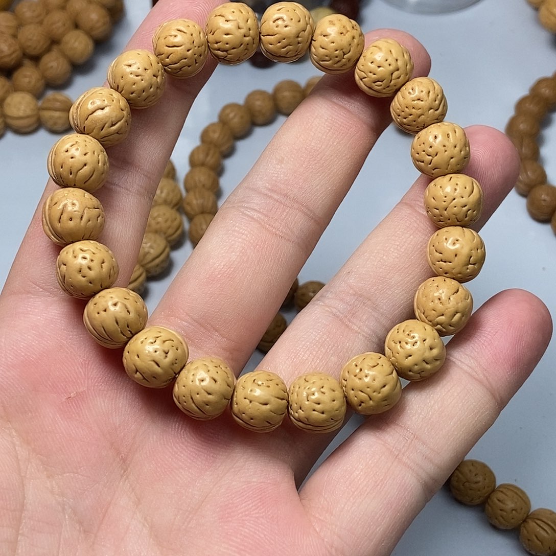 斌***你桃核手串111111111